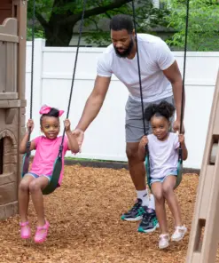 step2 naturally playful adventure lodge play center with glider boys playing basketball 03