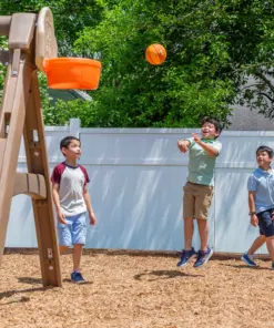 step2 naturally playful adventure lodge play center with glider boys playing basketball 06