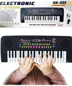 al3aby 42 a person's hands on a piano